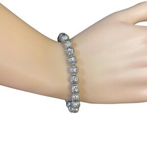 Silver Toned Beaded Stretch Bracelet One Size with Intricate Detailing